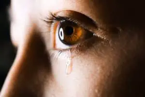 Treatment resistant depression, woman's eye with tears